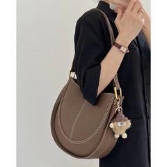 crescent saddle bag in textured leather – SANDRA