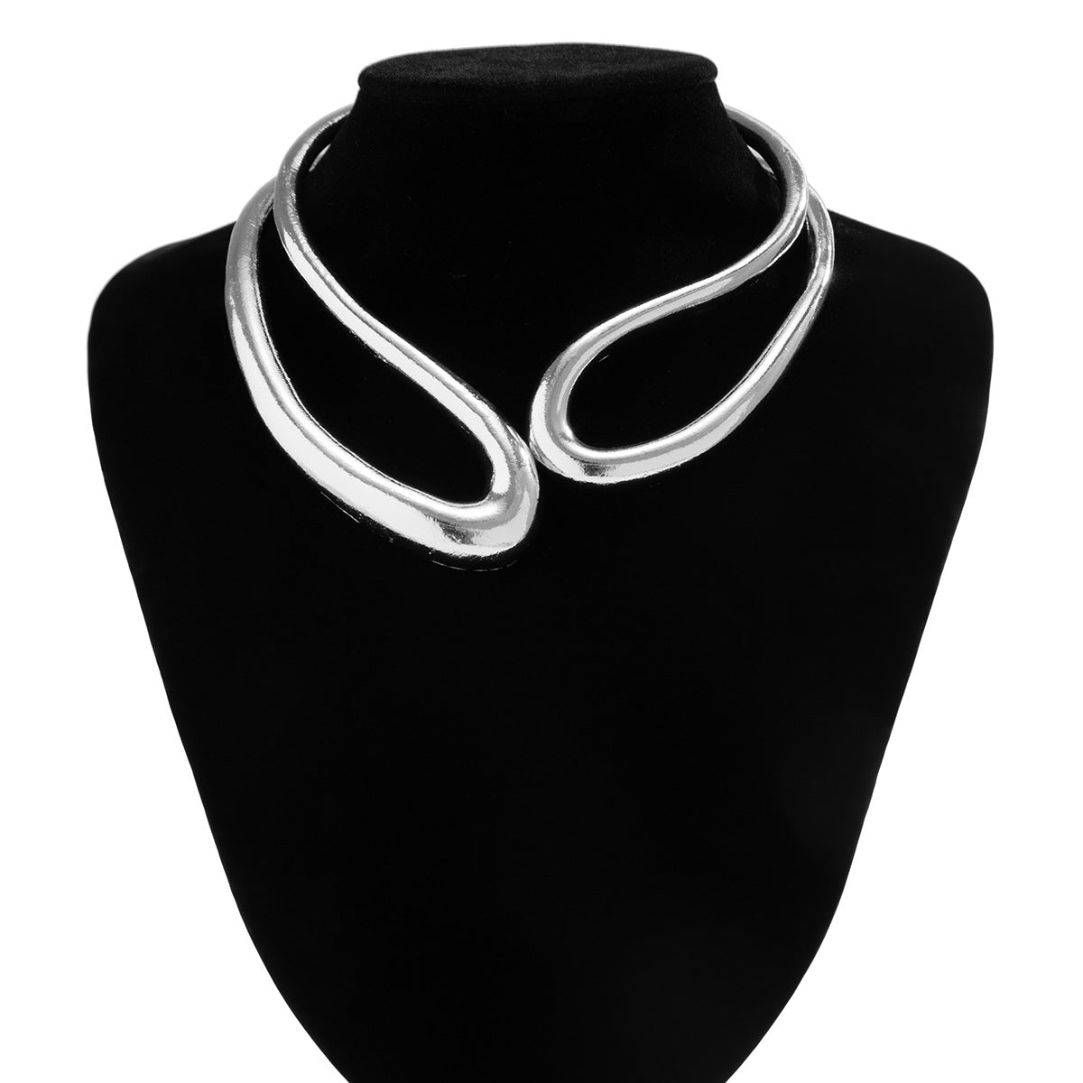 Twisted open metal choker with sculptural wave design - Dolkia