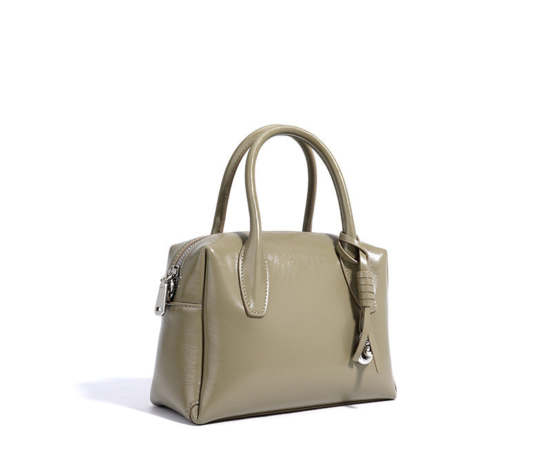 structured mini handbag with knotted charm - DELKA