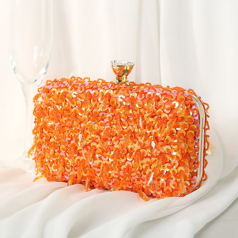 Pleated sequin clutch with diamond-shaped clasp - Puty