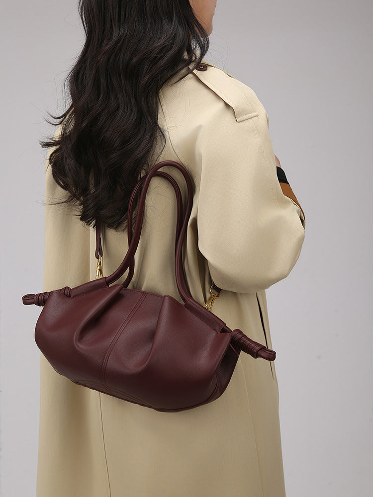 ruched crescent bag with knotted handles – NYRA