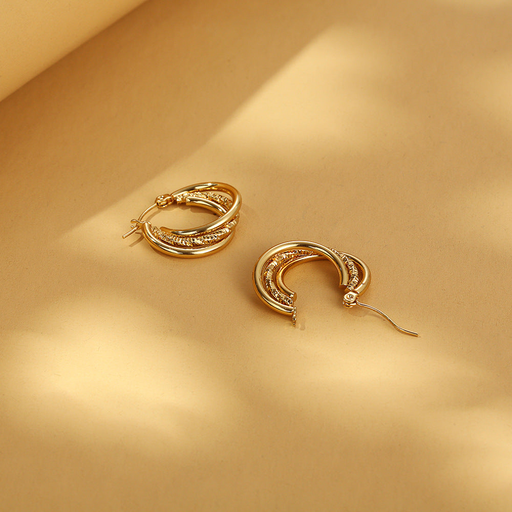Dual-layer textured hoop earrings with engraved detail – Akoma