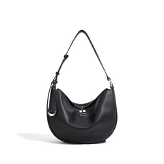 crescent moon shoulder bag with curved silhouette - STELZA