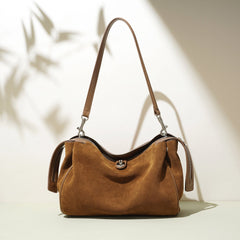 suede shoulder bag with curved zipper detail – TERRA