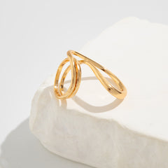 Open spiral ring with fluid wave shape – Lerwa