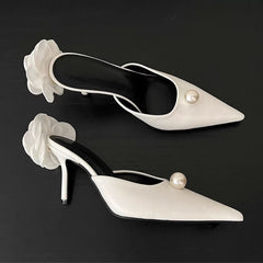 ivory pointed mules with pearl accent and floral heel – VELINA