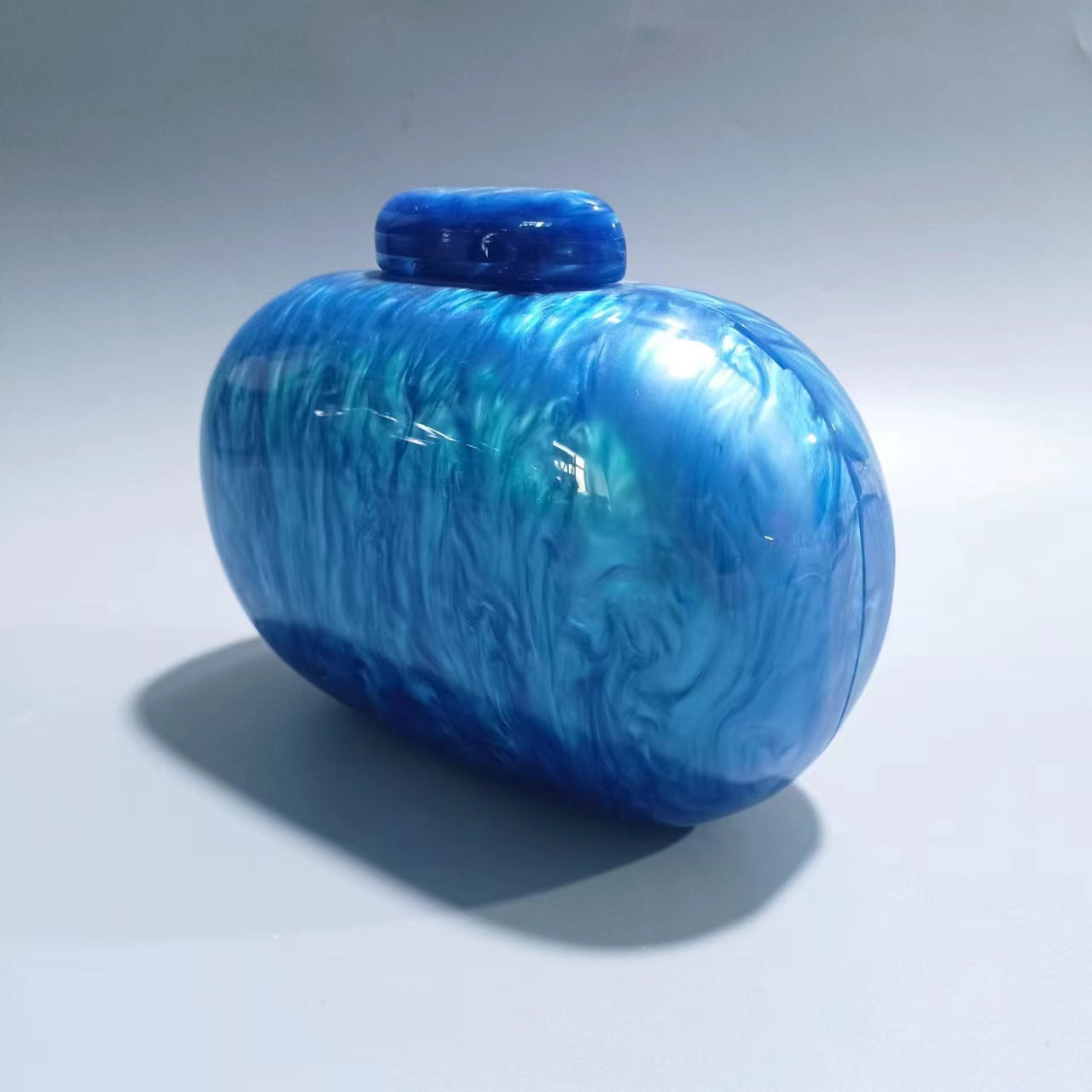 Marbled acrylic clutch with metal ring handle - Sundi