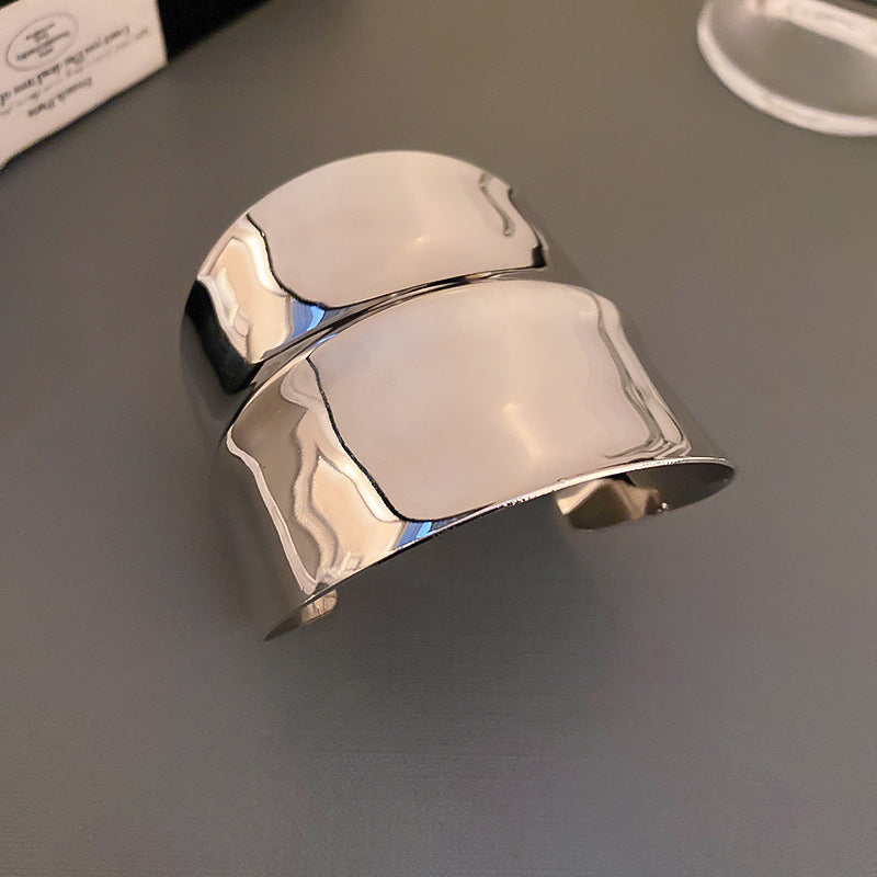 sculptural gold wide cuff bracelet with fluid contours – ARYO