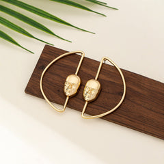 Gold abstract face earrings with geometric hoop frame - Avra