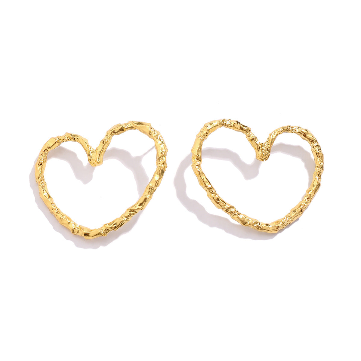 textured heart hoop earrings in matte gold – AMORA
