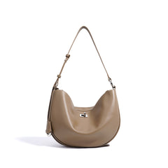 crescent moon shoulder bag with curved silhouette - STELZA
