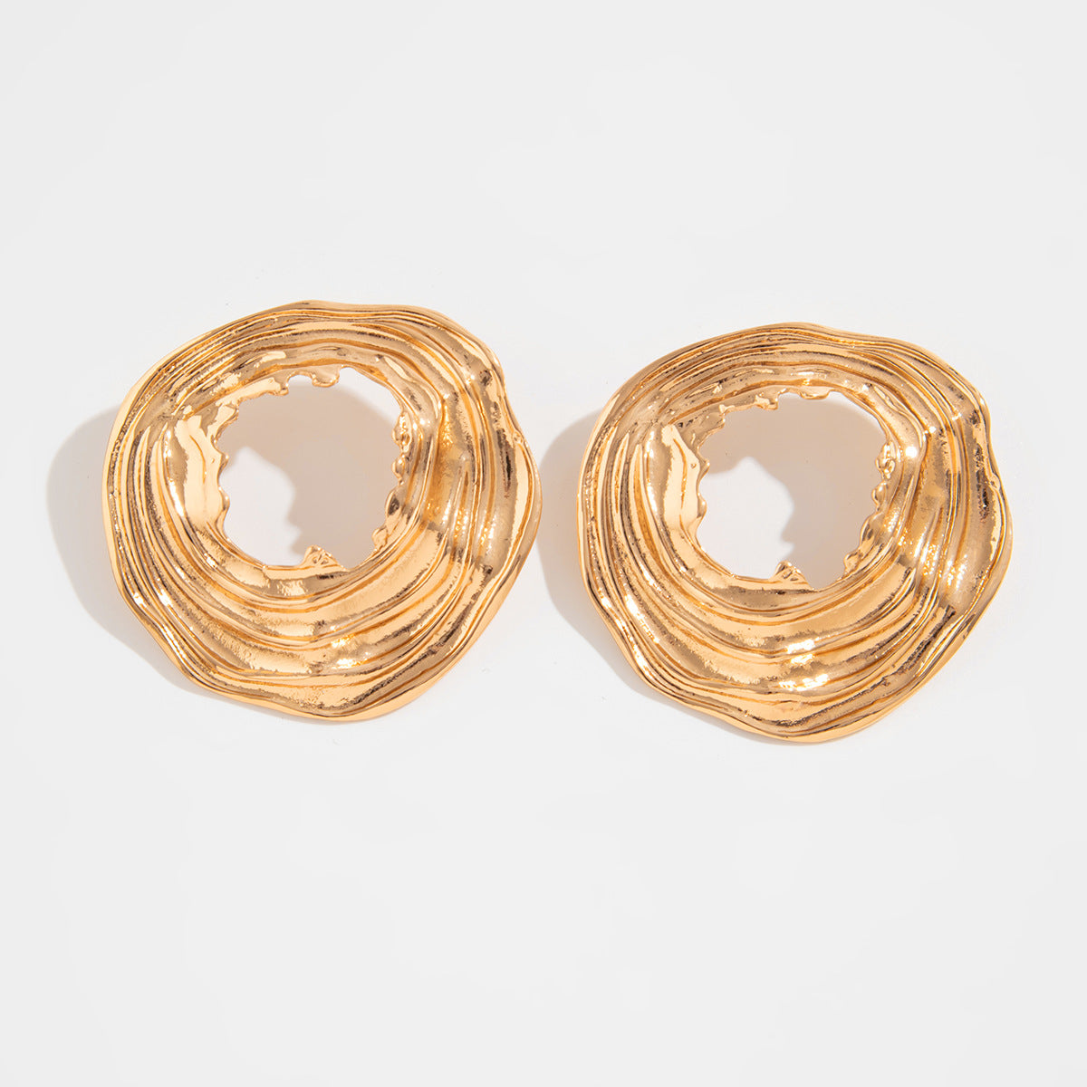 Textured open-circle earrings with sculptural ripples - Limali