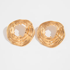 Textured open-circle earrings with sculptural ripples - Limali