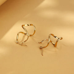 Twisted spiral hoop earrings with gold finish – Auzki