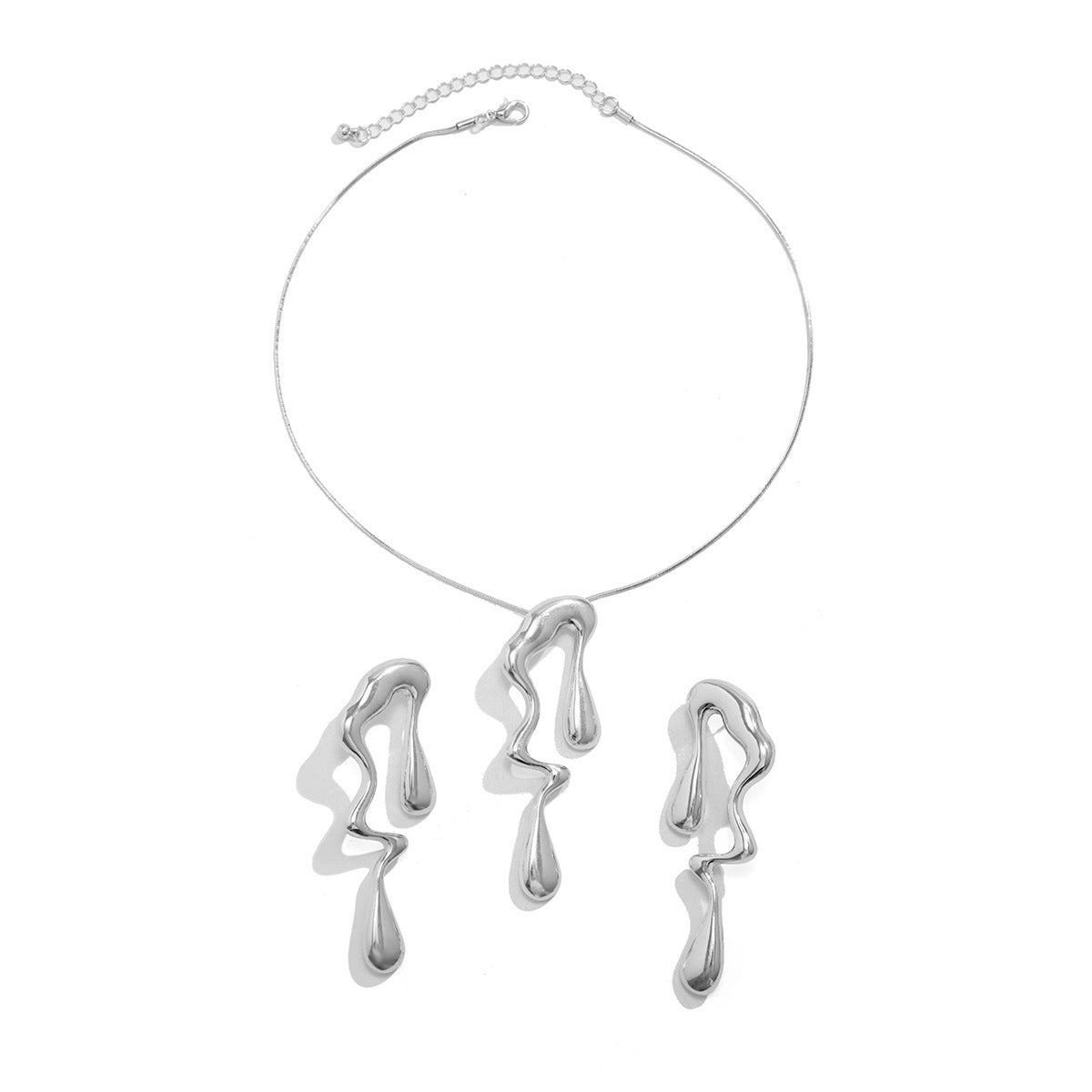 Asymmetric melted metal drop earrings - Nandi