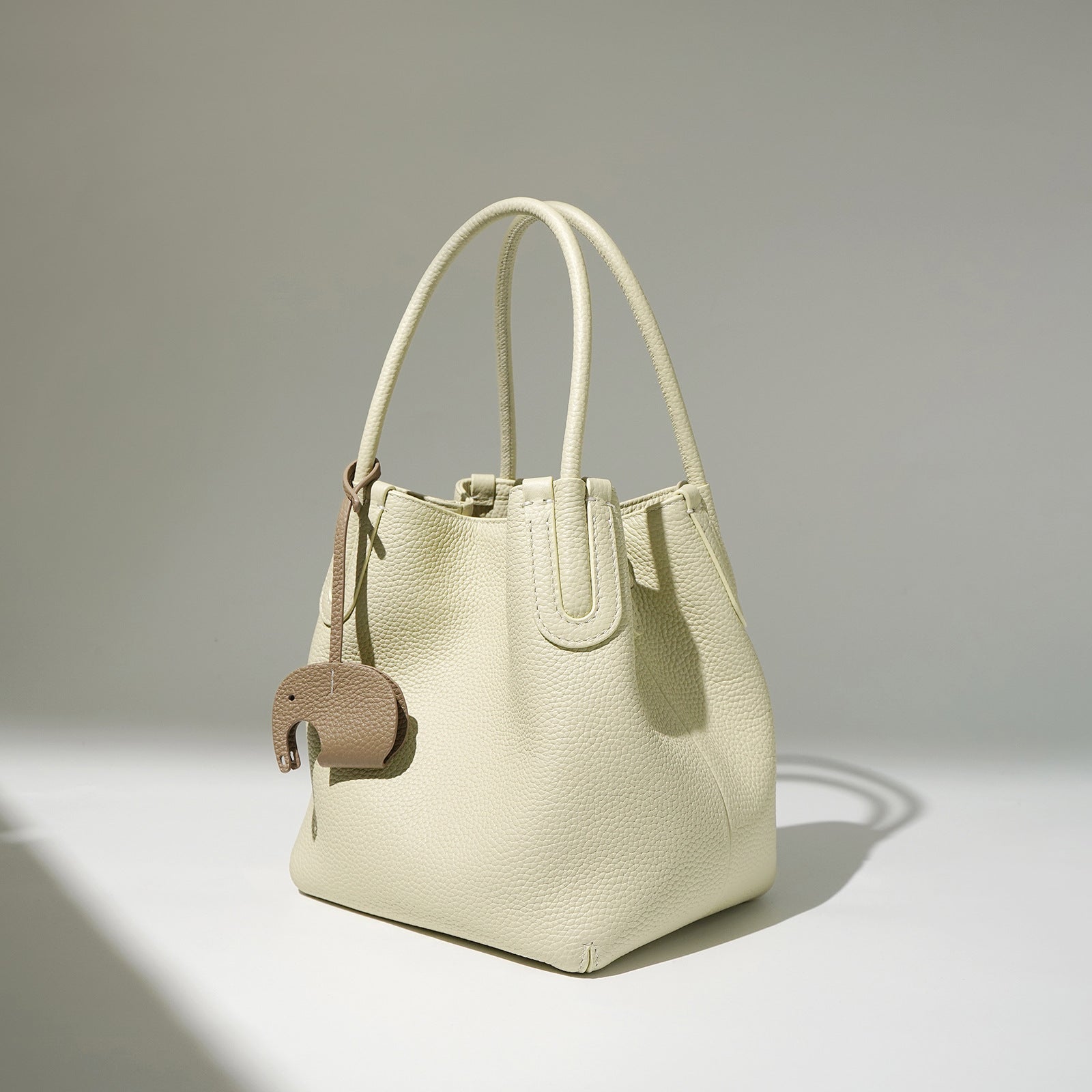 mini bucket bag with elephant charm – TERRA