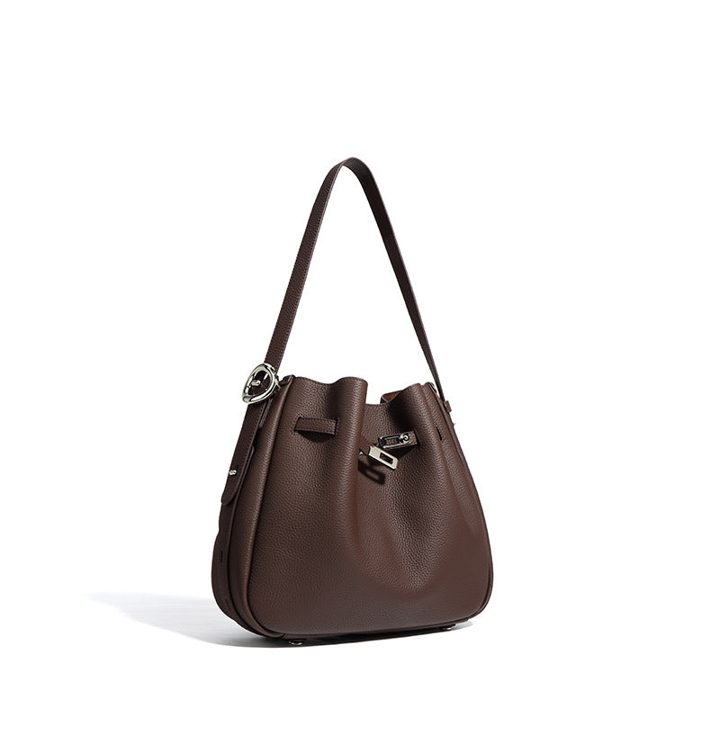 textured leather bucket bag with turn-lock strap – CAMELIA