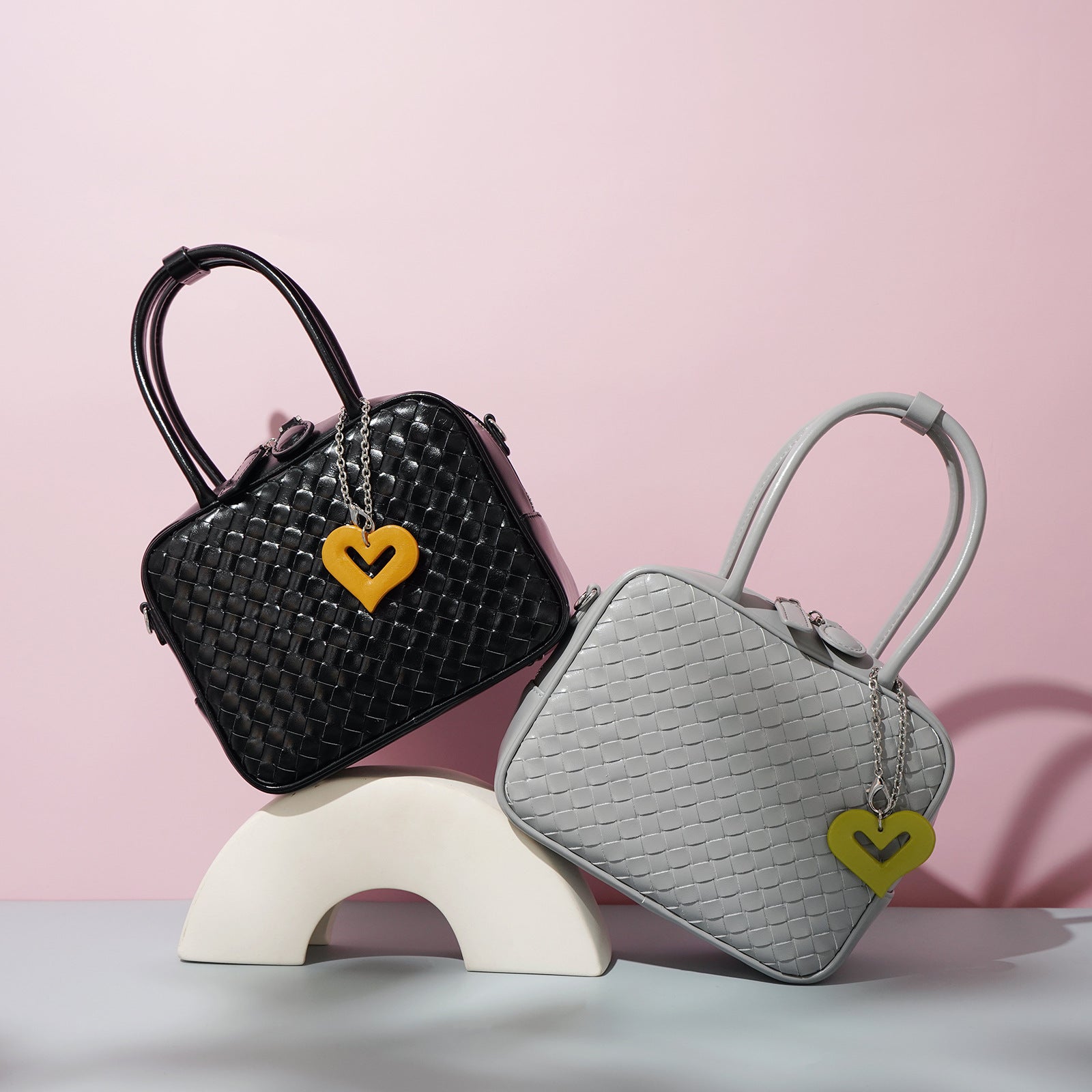 woven leather handbag with heart charm – AMORA