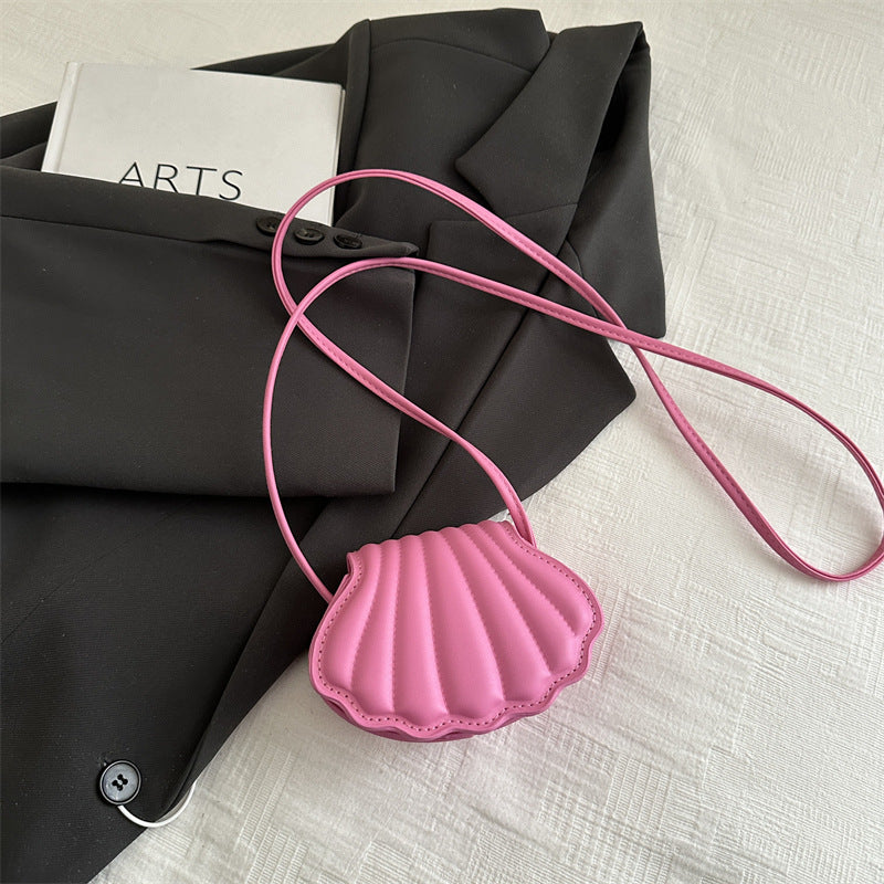 seashell leather crossbody bag in coral orange – MAREA