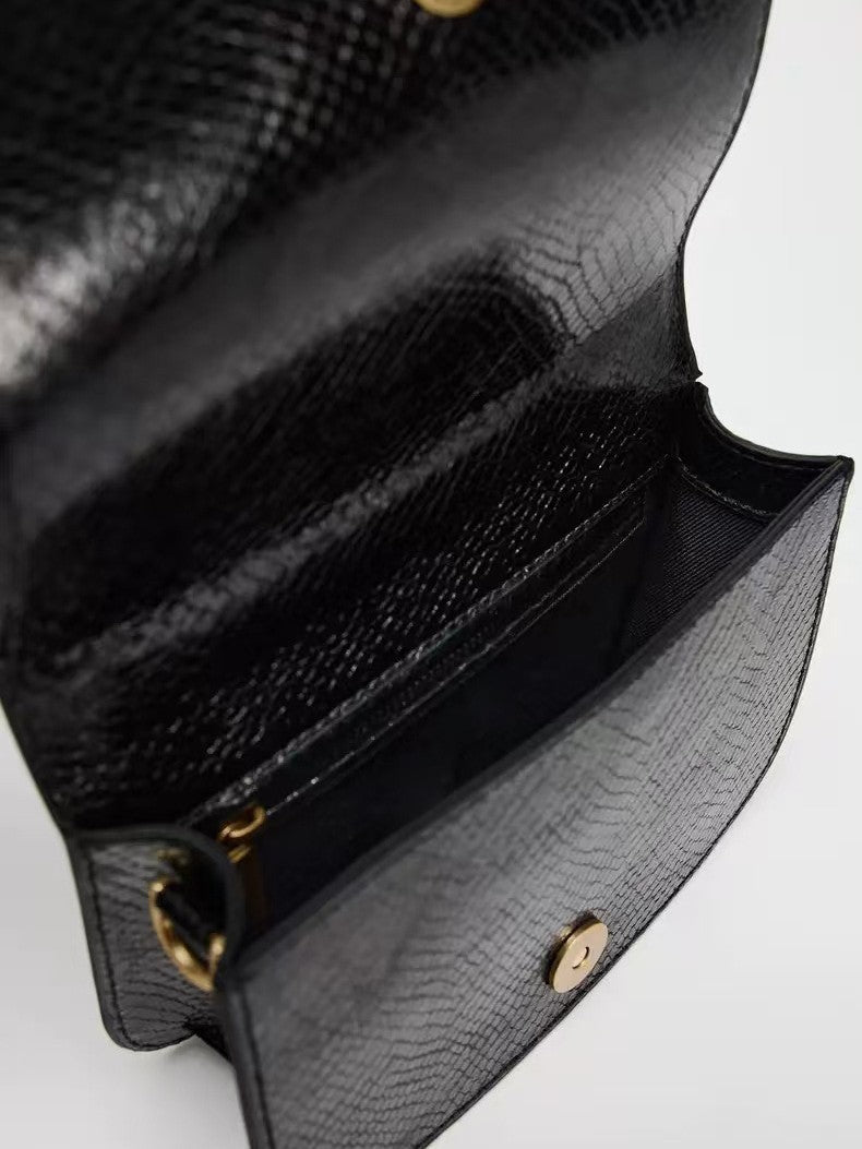 Sleek rectangular handbag with gold handle - Erju