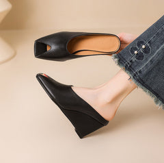 black leather wedge mules with open toe cutout – LUNARA