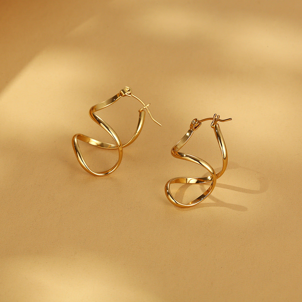 Twisted spiral hoop earrings with gold finish – Auzki