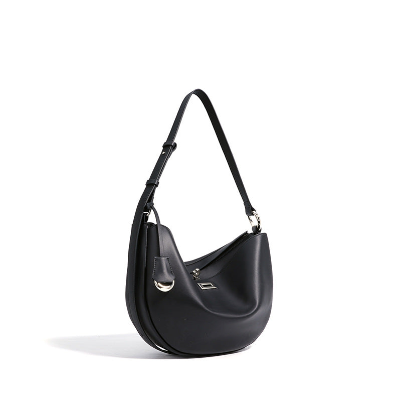crescent moon shoulder bag with curved silhouette - STELZA
