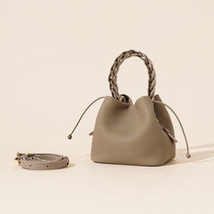 ivory pebbled leather bucket bag with braided top handle – CALISTA