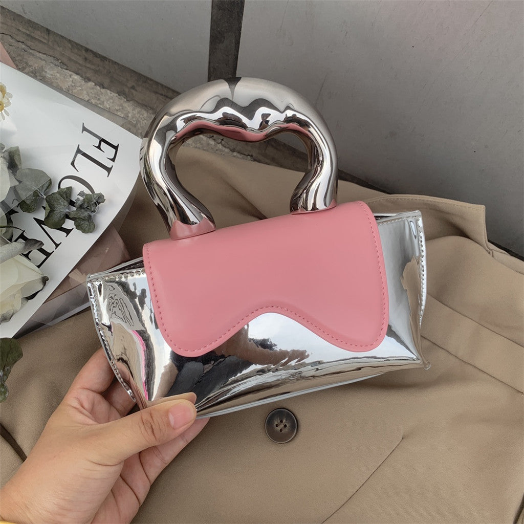 metallic-handle mini clutch with wavy flap - Xiuhtonal