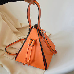 geometric pyramid crossbody with contrast trim – NOXAS