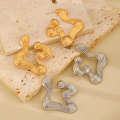 Ribbed abstract wave earrings with sculptural curves - Vasdy