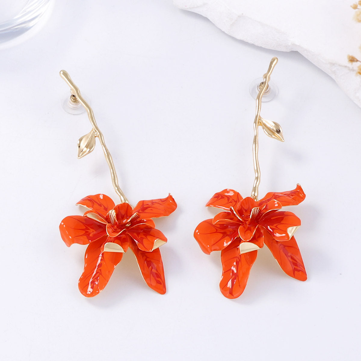 dangling orchid earring with gold stem – SIRENA