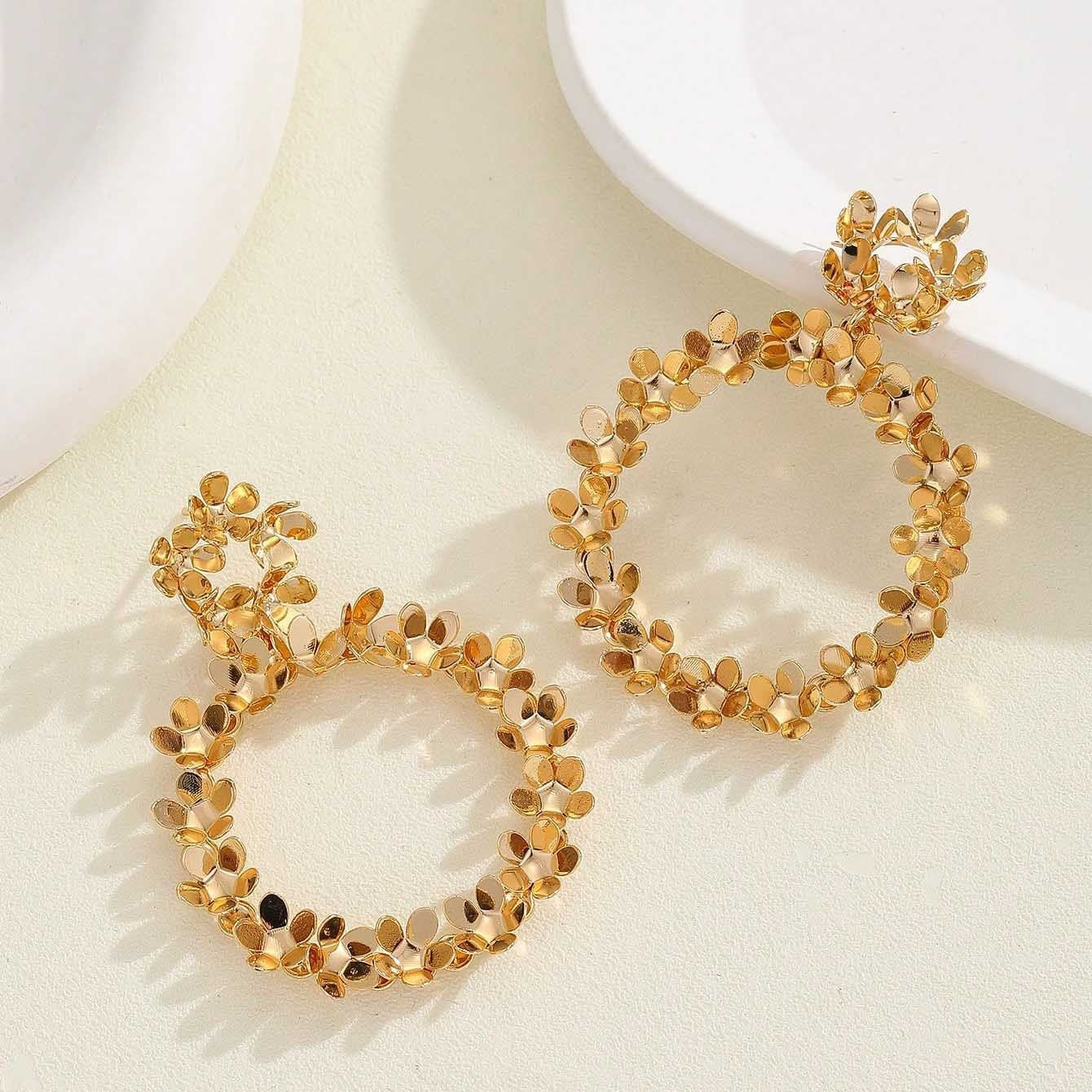 floral hoop earring with blue crystal centers – AURELIA