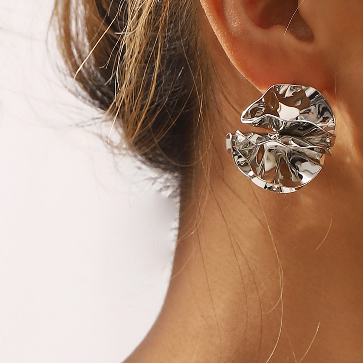 round folded metal stud earrings with embossed detail - ORAD