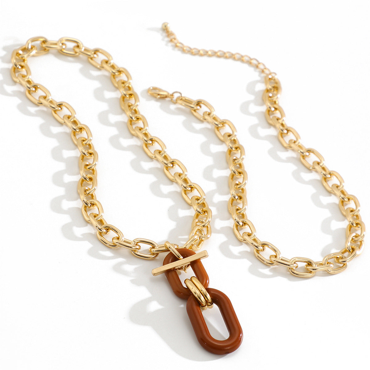 Chunky layered chain necklace with oversized pendant link - Netra