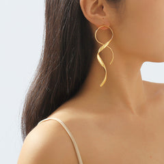 sculptural twist drop earrings – LUXA