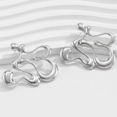 Sculptural drip-shaped earrings with statement curves – Lunimak