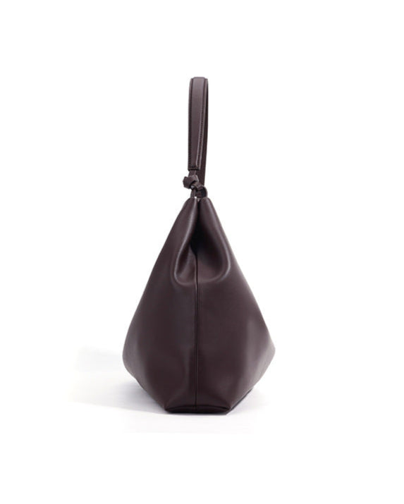slouchy shoulder bag with circular buckle strap - CASSIAZ