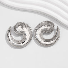 Swirl-shaped stud earrings with glossy finish - Tondi