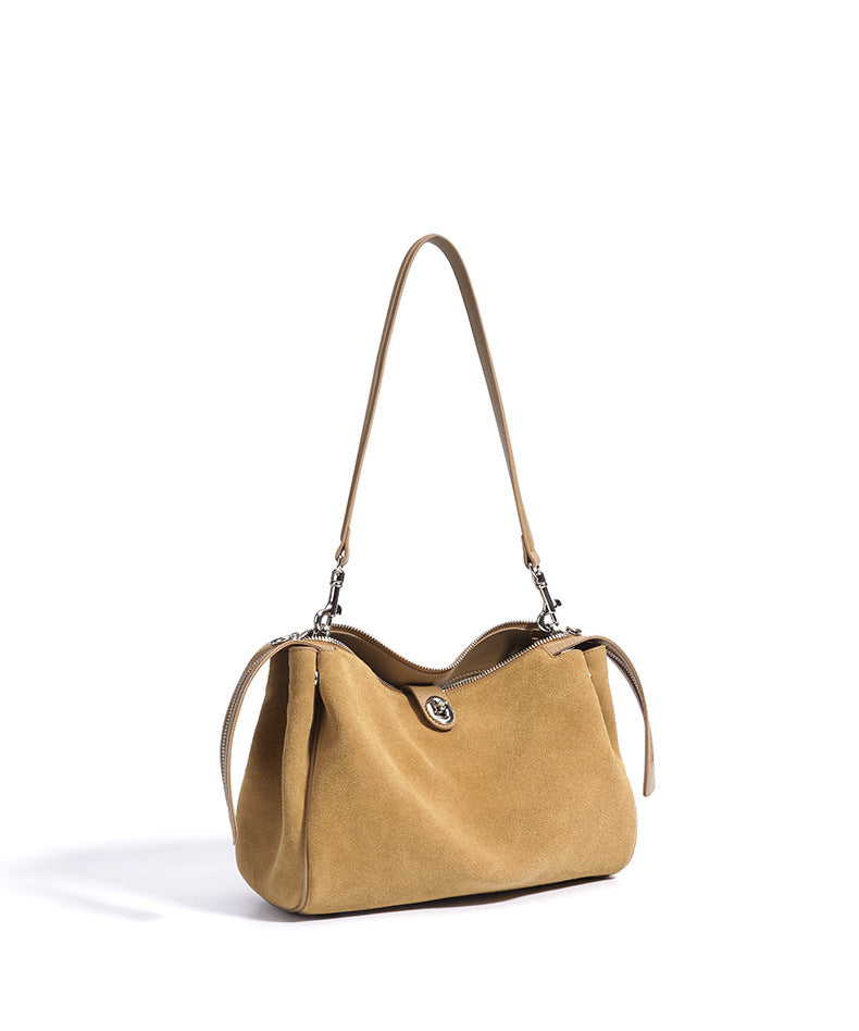 suede shoulder bag with curved zipper detail – TERRA