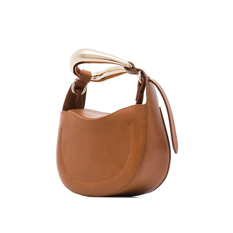 sculptural-handle saddle bag in tan leather – ARIS