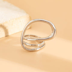 Open spiral ring with fluid wave shape – Lerwa