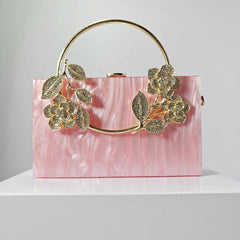 Geometric structured clutch with floral embellishments - Hirlu