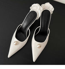 ivory pointed mules with pearl accent and floral heel – VELINA