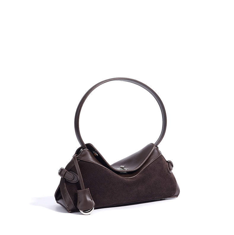 curved suede shoulder bag with flap closure – AURA