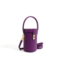 cylindrical top-handle crossbody bag with lock detail – ELINESE