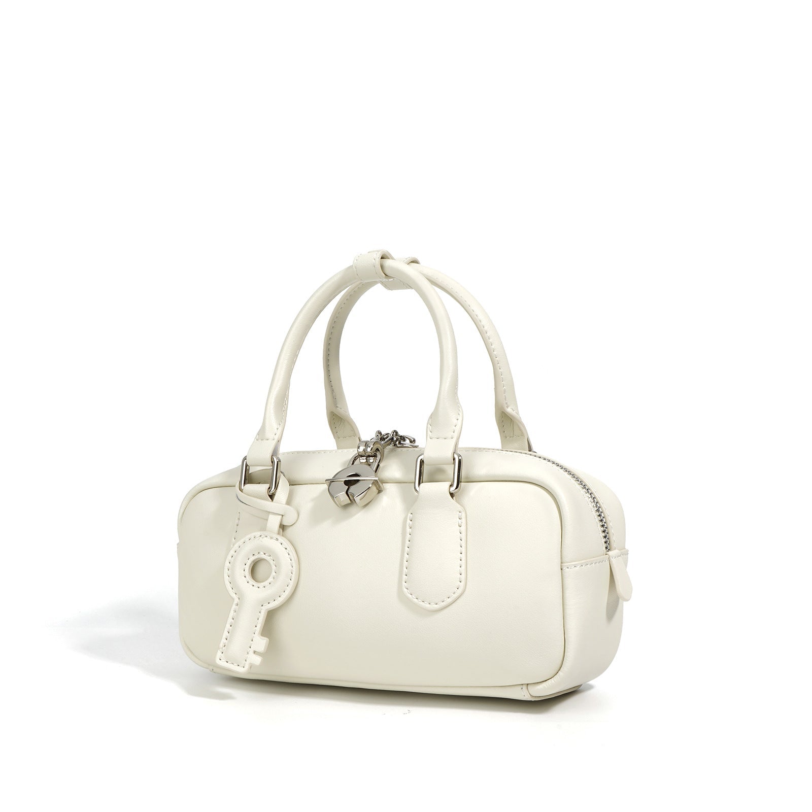 structured mini tote with key charm and top handles – NOLAR