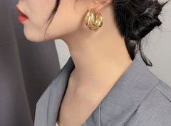 Triple hoop drop earrings in polished gold-tone finish - Arma