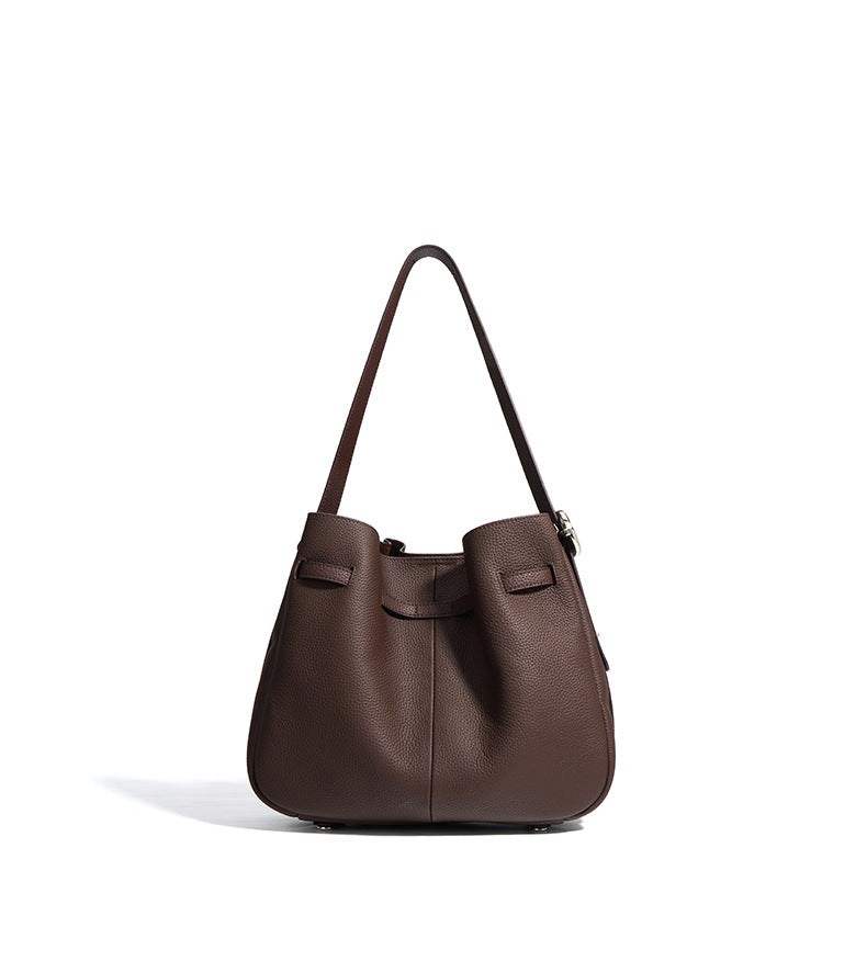 textured leather bucket bag with turn-lock strap – CAMELIA