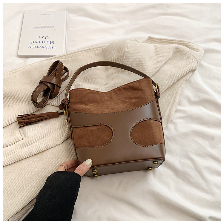 suede bucket bag with curved leather trim – RUBY